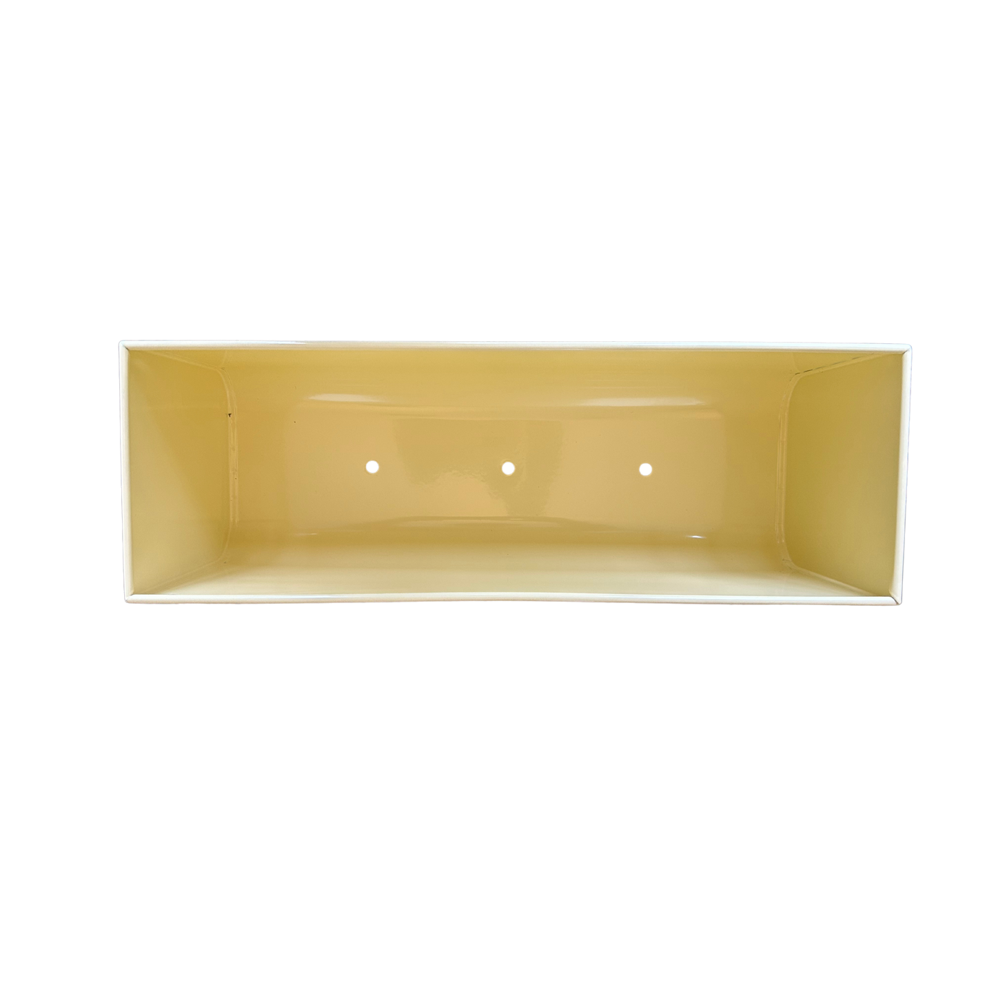 inside view of empty cream planter showing drainage holes